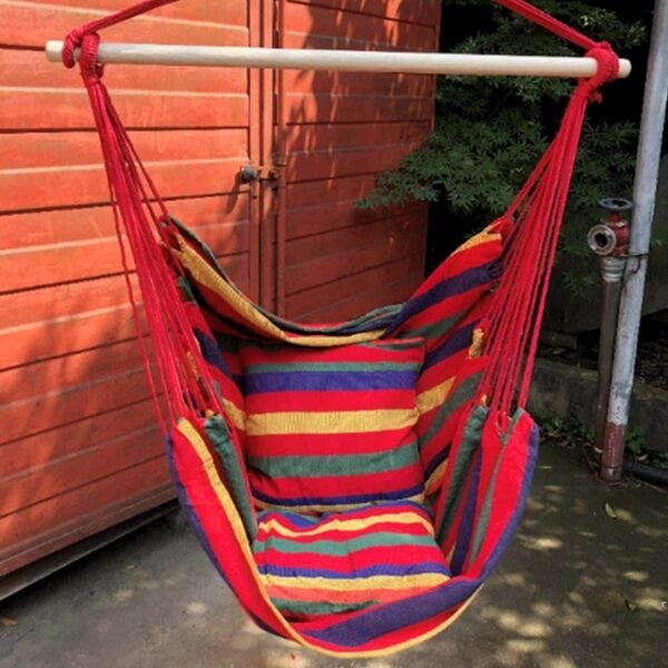 Red Hammock in Natural Outdoor Setting.