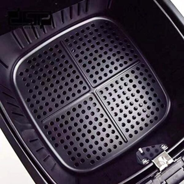 Close-up of DSP air fryer's spacious 8.5L interior basket, ready for delicious creations.