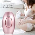 Woman smiling while using IPL laser hair removal device on her thighs.