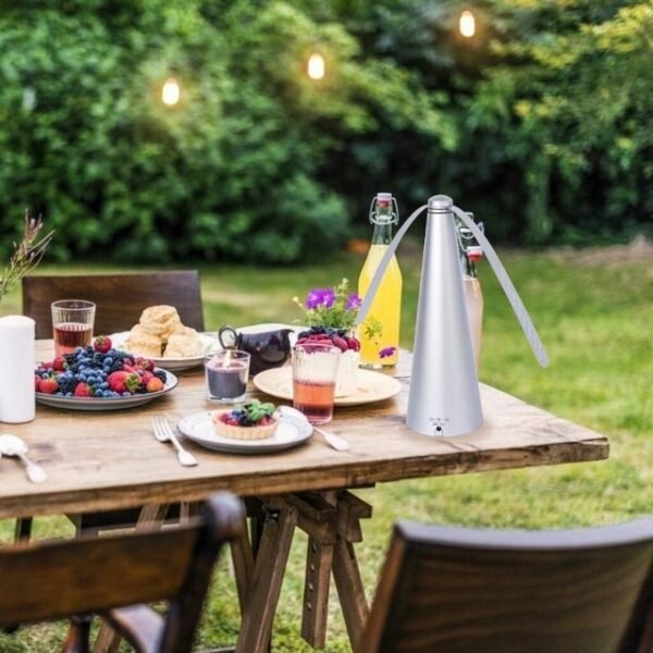 Elegant Protection - Fly Repellant Fan on Garden Table.