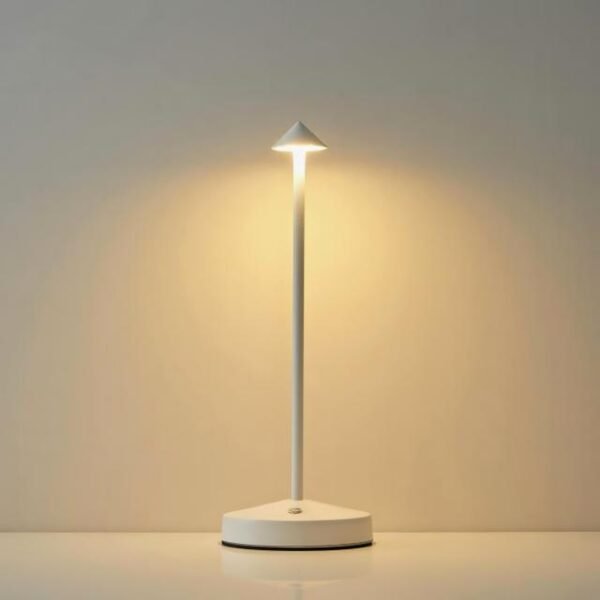 Minimalist white table lamp with long-lasting battery on a smooth surface.