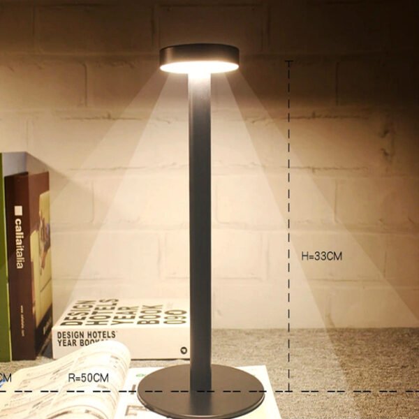 Modern table lamp dimensions 34 x 15 cm, lightweight and portable.