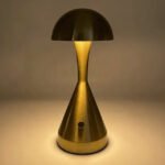 Modern mushroom table lamp with bronze finish, perfect for decor.