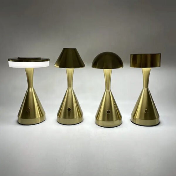 Group of bronze table lamps featuring modern mushroom design.