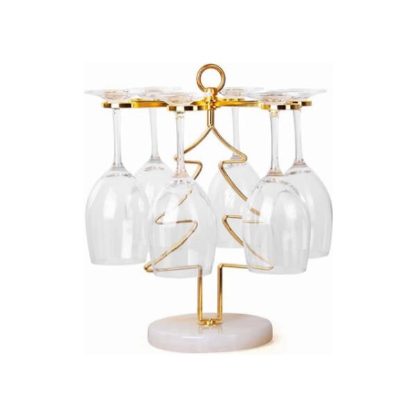 Christmas tree wine glass holder against white background, gold and jade base.