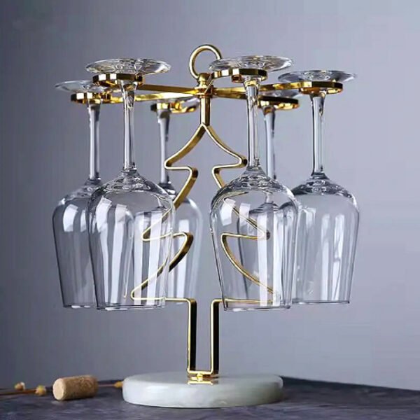 Christmas tree glass holder securely holding six wine glasses for special occasions.