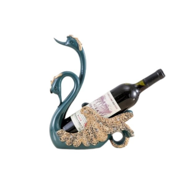 A golden swan wine rack, adorned with dazzling diamond accents, cradles a vintage wine bottle against a pristine white backdrop.