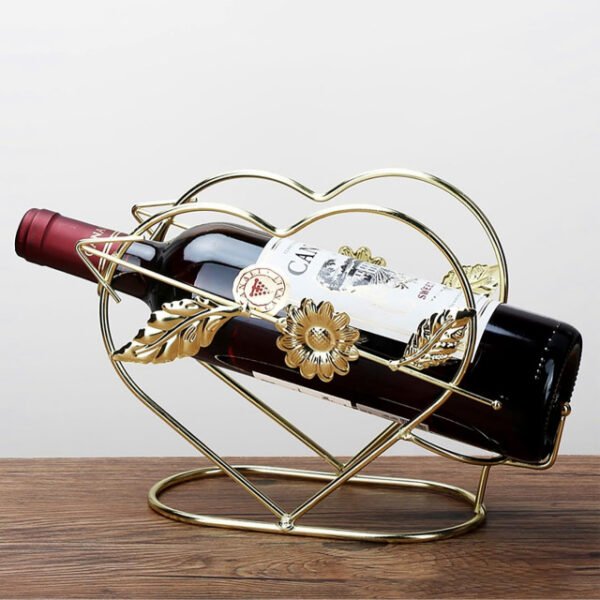 Cupid wine rack on a wooden counter with a gold finish and durable iron.