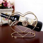 Cupid wine rack displaying a wine bottle, ideal for home bars and kitchens.