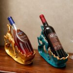 Two graceful deer wine racks from the back showing secure bottle storage.