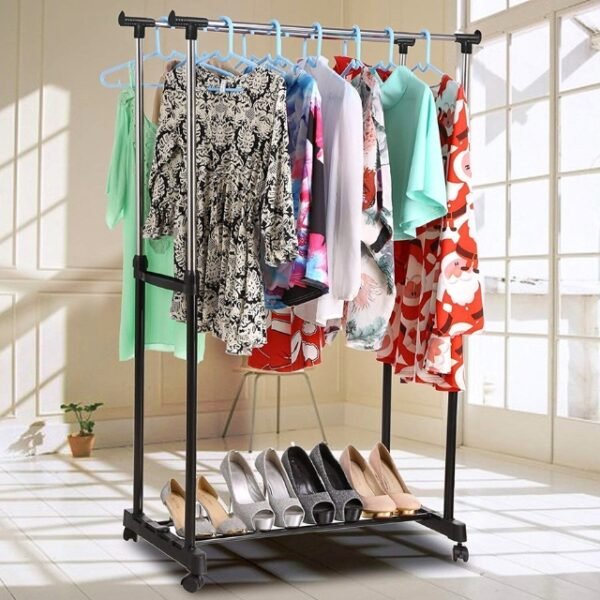 Double Pole Clothes Rack showcasing its strength by holding elegant garments. Caption: Strong and Stylish - Our Double Pole Clothes Rack!