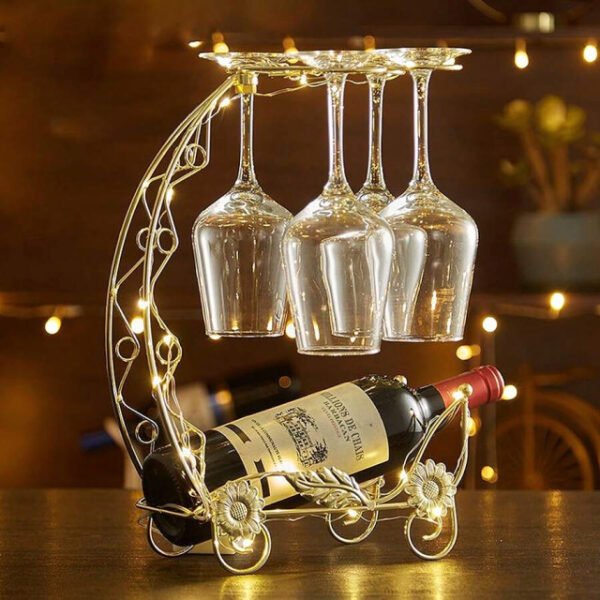 Dragon boat wine rack with light bulbs holding wine bottle and glasses.