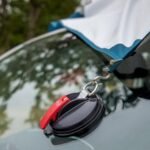 Suction Anchor Plus holding items securely on a car's rear.