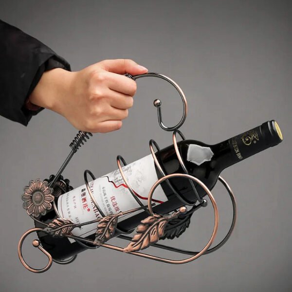 Floral wine bottle holder with carry handle for easy portability.