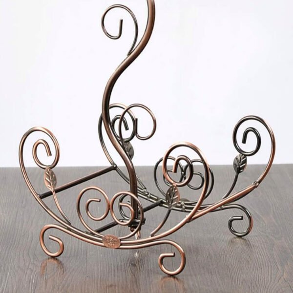 Rose gold vine wine rack with large anti-corrosion base holding two wine bottles.