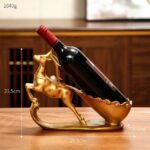 Lightweight deer wine rack measuring 29.5 x 9.5 x 21.5 cm showcasing one bottle.