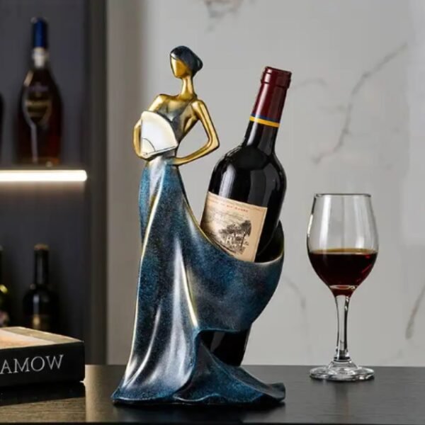 Elegant royal blue Lady of Pearls wine holder on a countertop.