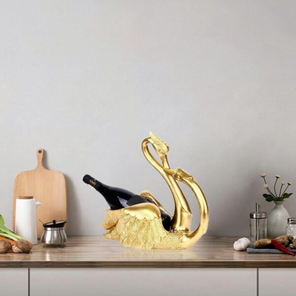 Love swans wine rack in gold on kitchen counter with romantic swan design.