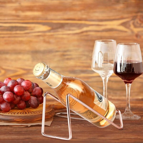 Sleek and modern minimalist wine bottle holder cradling a wine bottle.