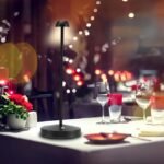 Nordic table lamp in black placed on a table, ideal for decorating special anniversaries like weddings and holidays.