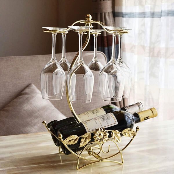 Olive wine rack on a living room table with 2 wine bottles and 6 glasses.