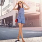 Stylish lady flaunts smooth legs thanks to Philips Satinelle.