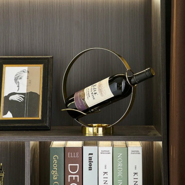 Round wine bottle holder displayed in book library for home decor.