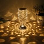 Scaly transparent table lamp in bedroom.