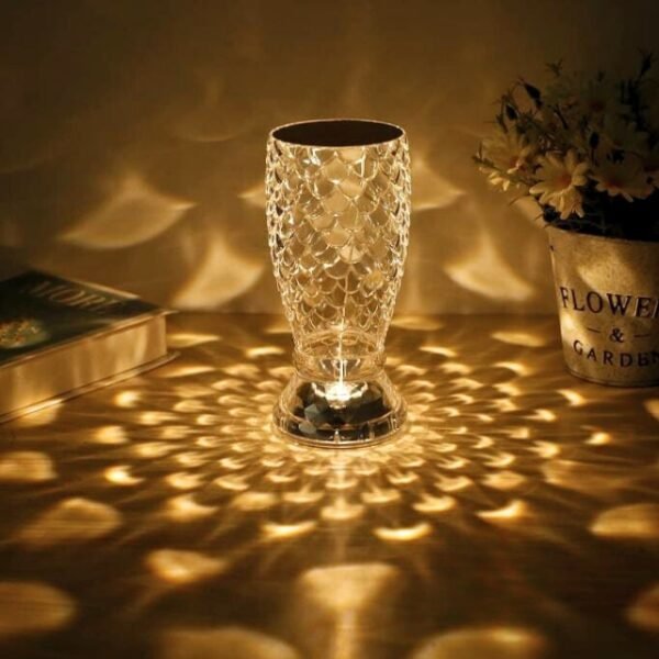 Scaly transparent table lamp in bedroom.