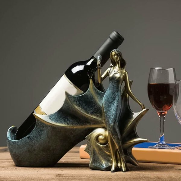 Sea snail wine rack artistically holding wine glass with detailed resin sculpture.