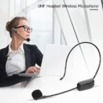 Young professional using AY-101 Wireless Microphone for customer service.