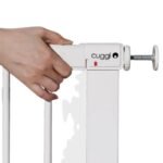 Woman's hand installing Cuggl safety gate.
