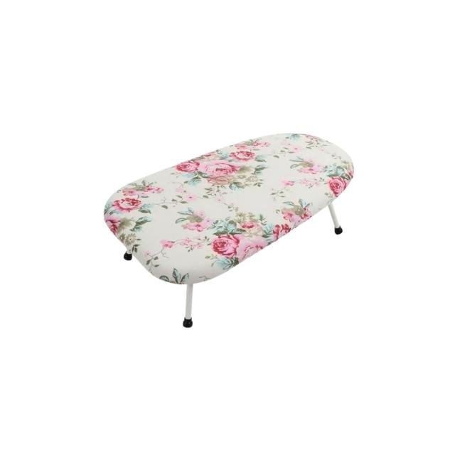 Floral Ironing Board with steel legs on white background.