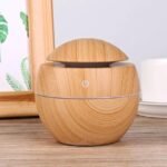 Space-friendly light brown air freshener on a household counter.