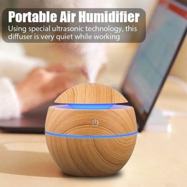 Modern air freshener using ultrasonic technology for silent scent diffusion.