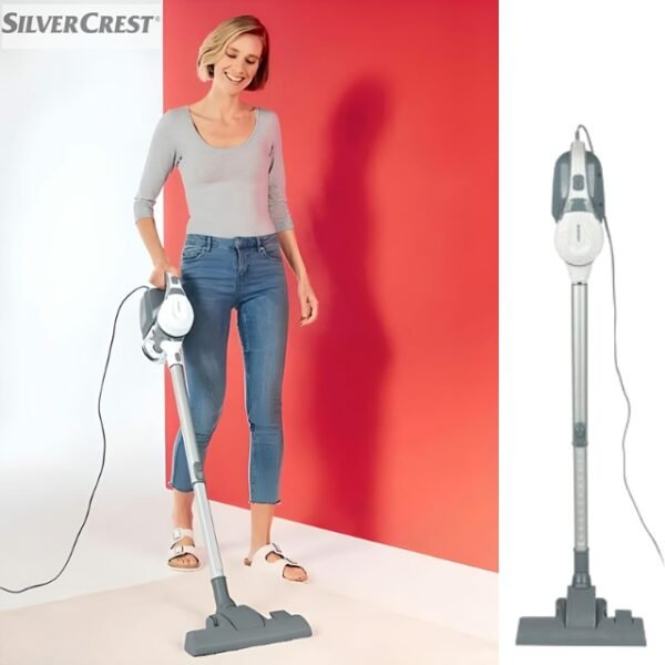 Happy woman with Silvercrest 2-in-1 Vacuum Cleaner.