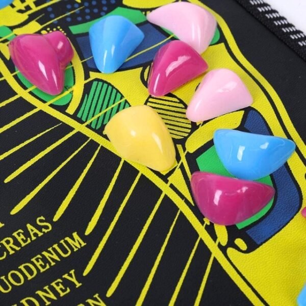 Close-Up of Colorful Healing Stones on Acupuncture Foot Massage Mat