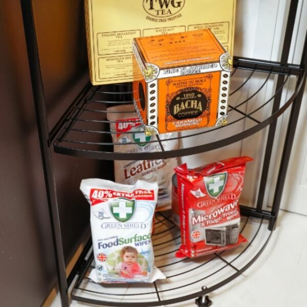 Close-up: Sturdy 4-tier shelf stocked with kitchen goods.