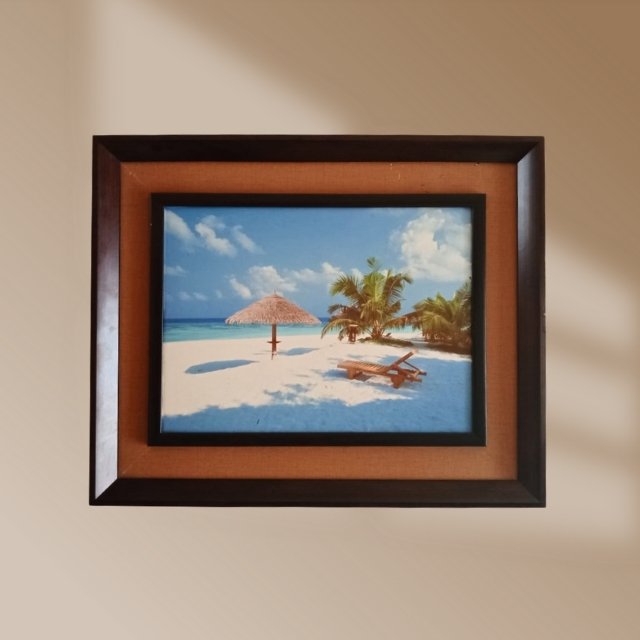 Coastal charm in a framed beach view portrait – an artful home décor centerpiece.