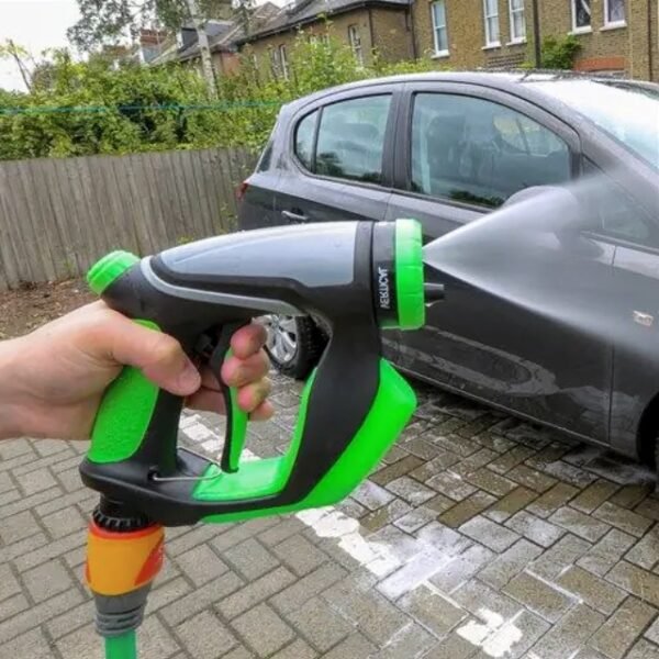 Foam spray gun widely distributing water for car and garden use.