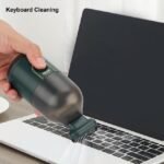 Mini Vacuum Cleaner Ideal for Keyboard Cleaning – Compact and Efficient.