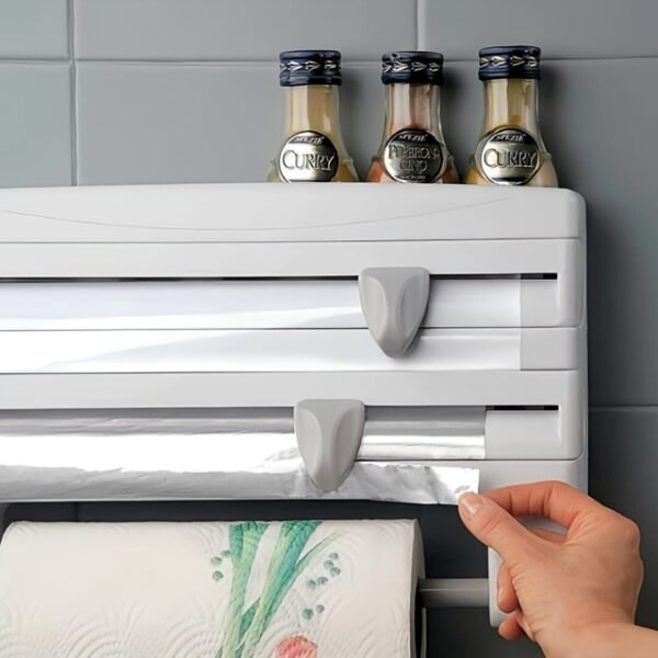 Dispenser for cling film, tin foil, and paper towels, easily cut to preferred dimensions, up to 28cm.