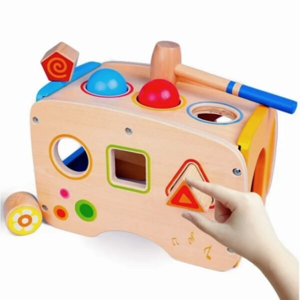 Exercise tactile development with Rolimate Hammering & Pounding Toys.