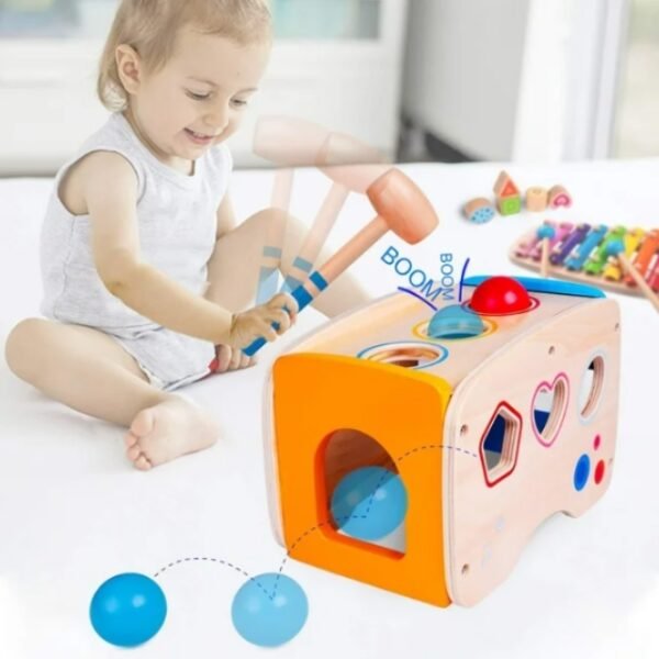 Child enjoys Rolimate pounding and hammering – suitable for 12 months - 6 years.