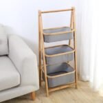 Space-friendly 3-tier laundry rack measuring 110x40 cm.