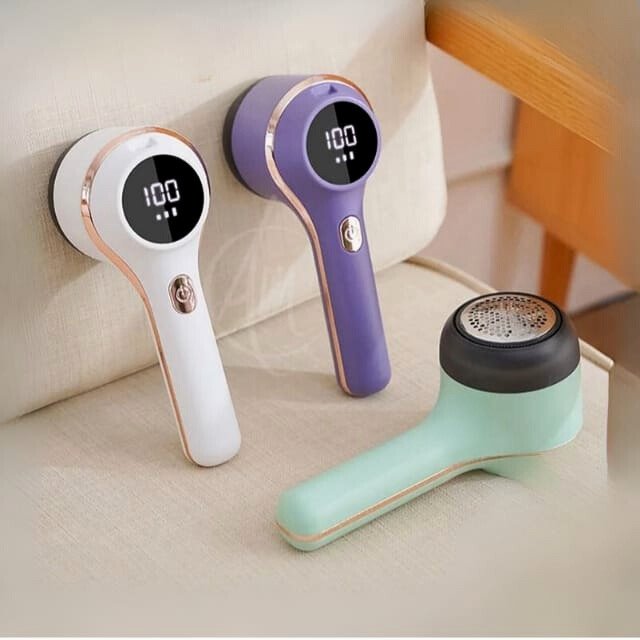 Digital lint remover in vibrant purple.