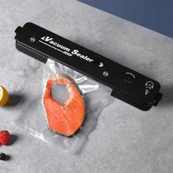 Food vacuum sealer preserving freshness in a bag.