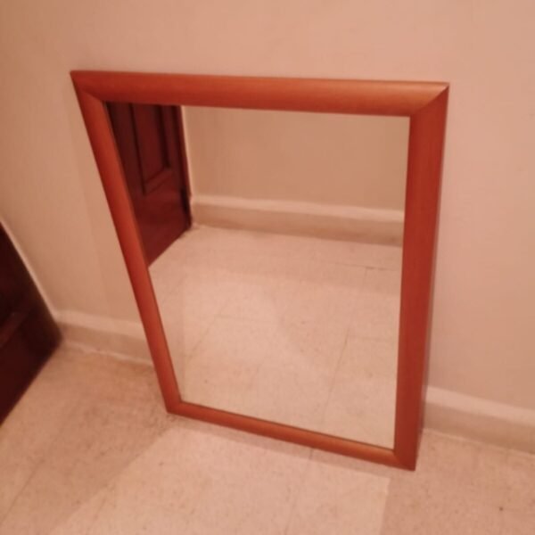 Household mirror with wooden frame front