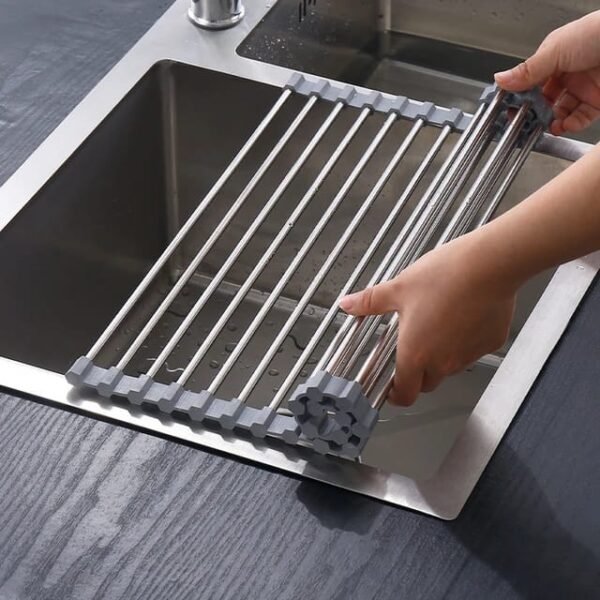 Space-saving roll-up sink drying rack for convenience.