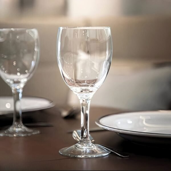 French Quality Glow: Luminarc Wine Glass Set on Dinner Table.